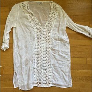 White beach coverup with crochet details